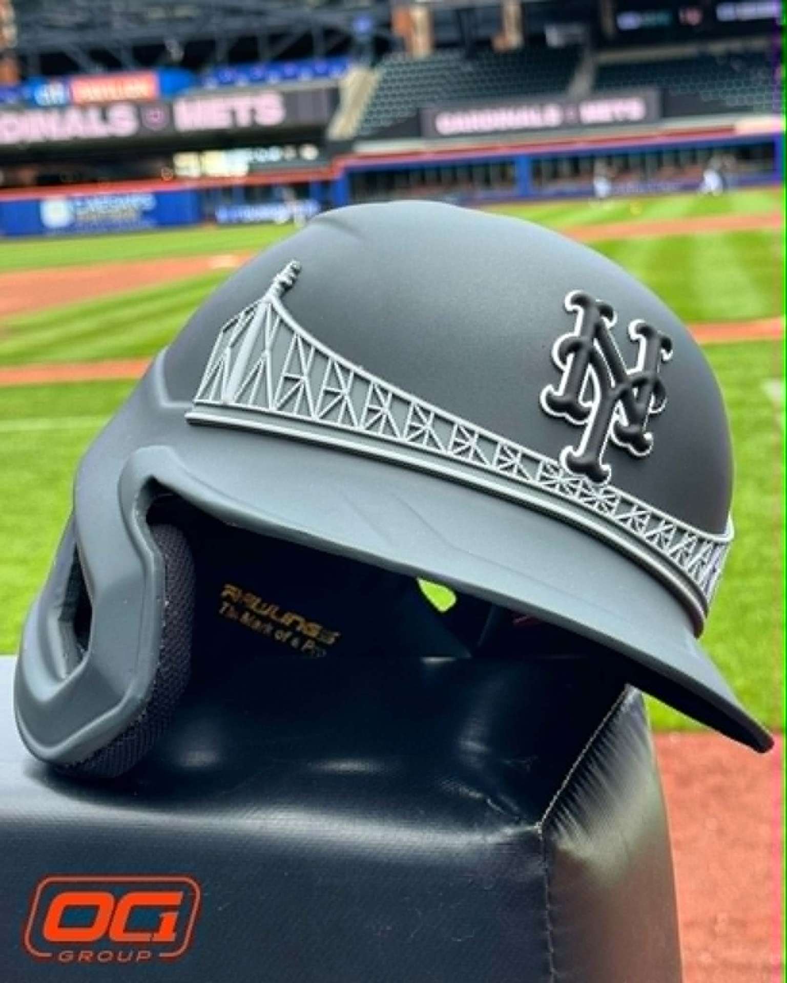 Matte black New York Mets batting helmet with 3D Queensboro Bridge decal and dimensional NY logo